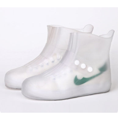 White rain boots with a green logo on a white background