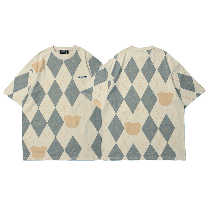 T-shirt with argyle pattern and bear design on a white background