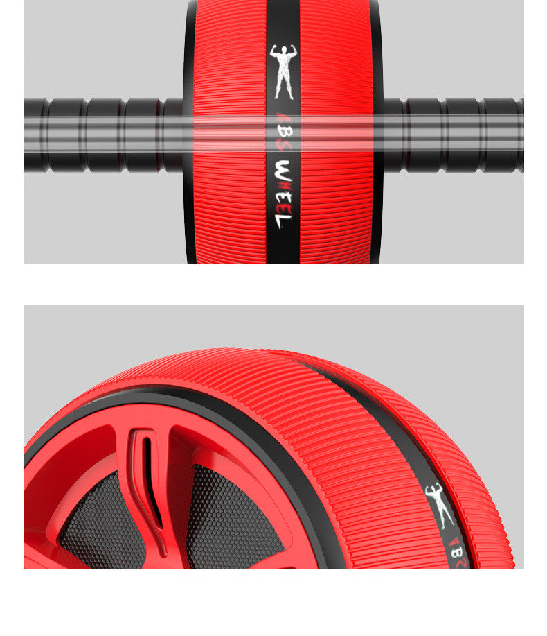 Red and black exercise wheel with 'B Well' branding on a gray background