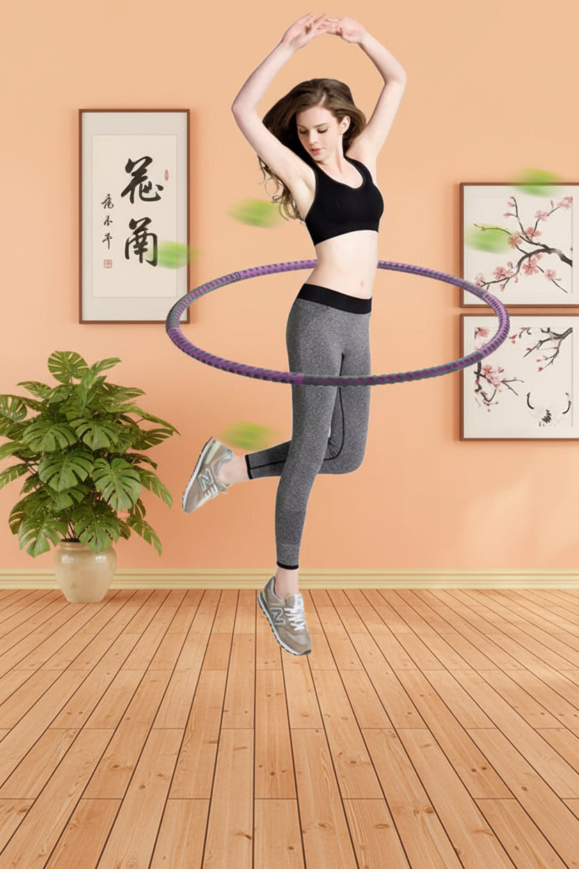 Woman exercising with a hula hoop in a room with a plant and wall art.