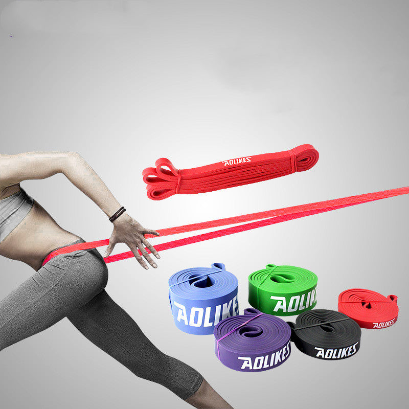 Person using resistance bands with visible 'AOLIKES' branding on a gray background