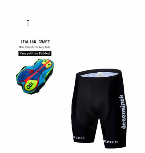 Black cycling shorts with competitive padding and a small inset of colorful shoes on a white background.