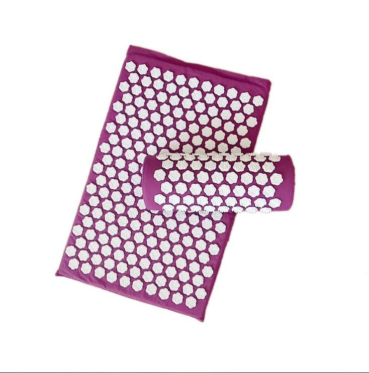 Purple acupressure mat with white dots on a white background
