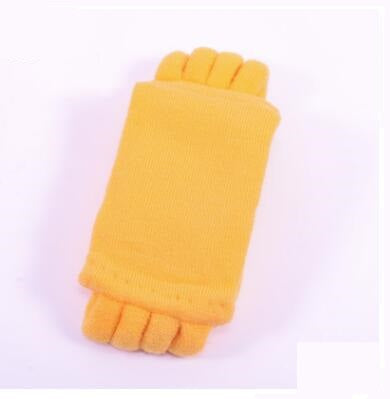 Yellow fingerless gloves on a white background