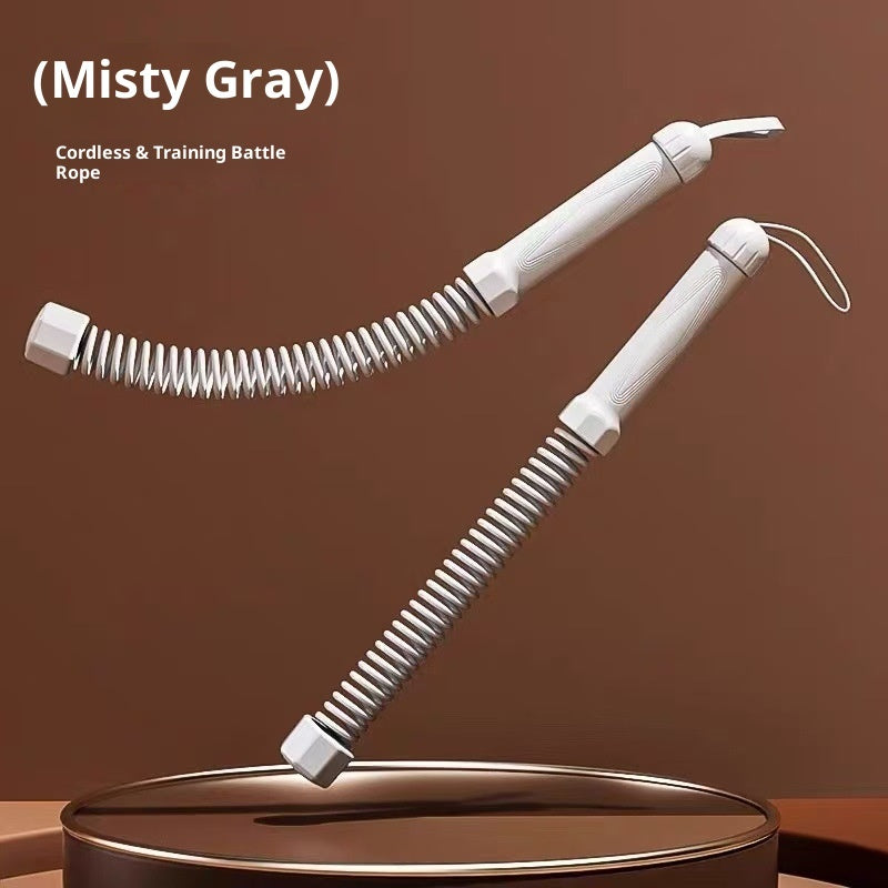 Cordless and training battle rope with a misty gray handle on a brown background