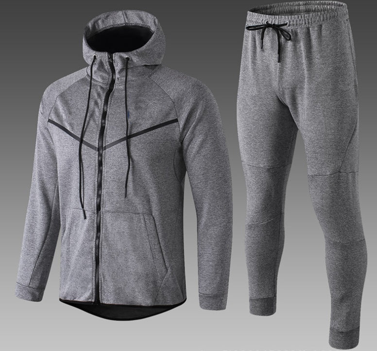 Gray tracksuit with jacket and pants on a gradient background