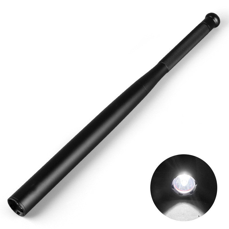 Black telescopic flashlight on a white background
