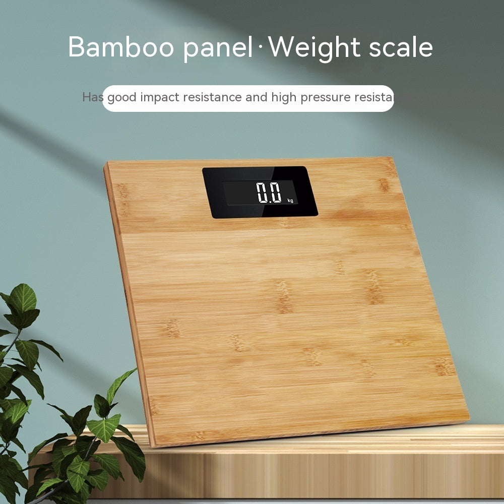 Wooden weight scale with digital display on a light blue background