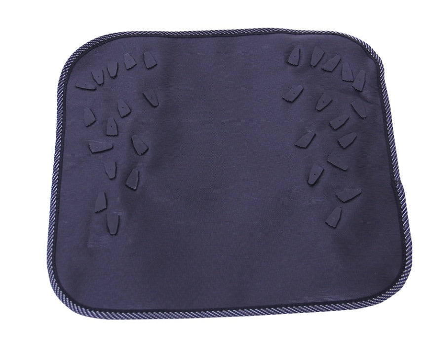 Navy blue cushion with textured patterns on a white background