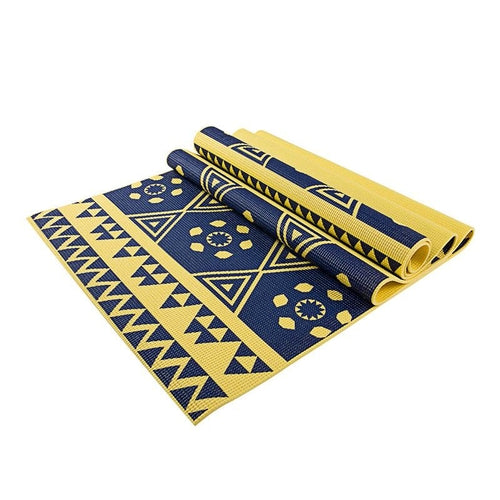 Blue and yellow patterned yoga mat on a white background