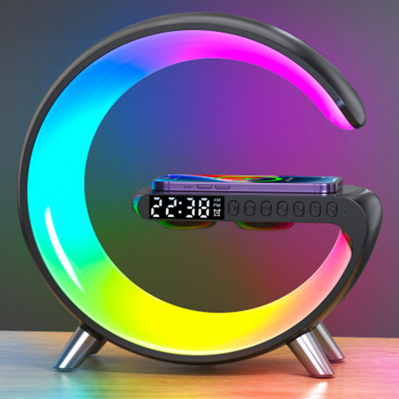 Colorful LED lamp with digital clock and phone stand on a gradient background