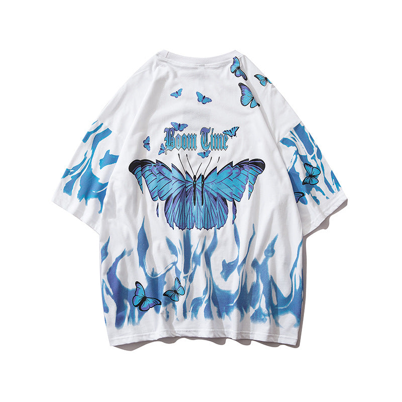 White t-shirt with blue butterfly designs and 'Bom Time' text on a white background