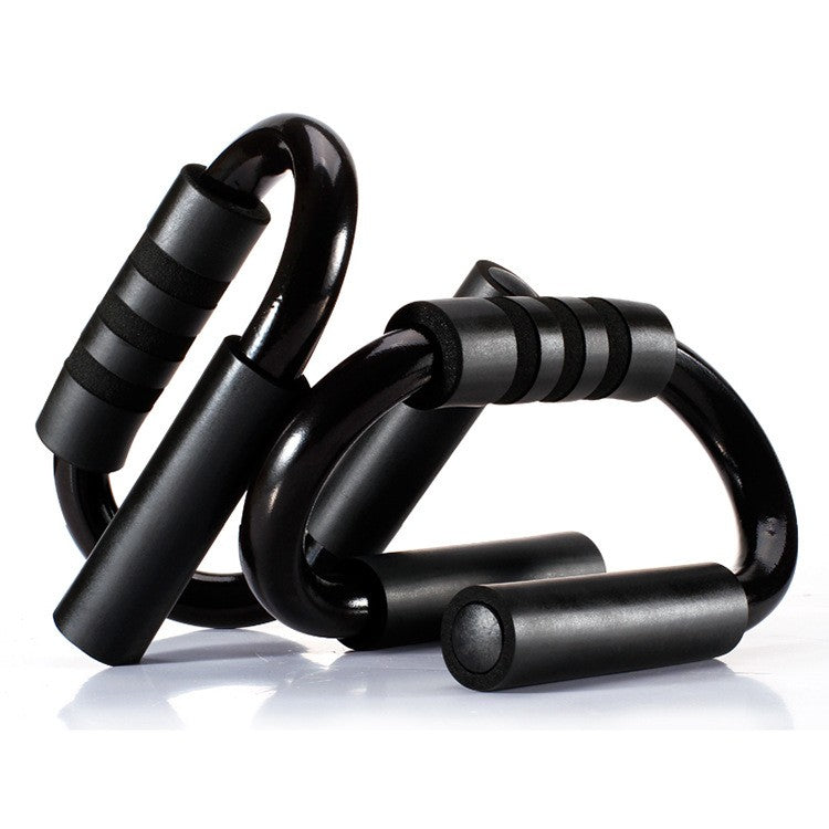 Black exercise rings stacked on a white background