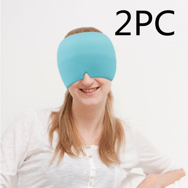 Person wearing a blue sleep mask with '2PC' text above on a white background