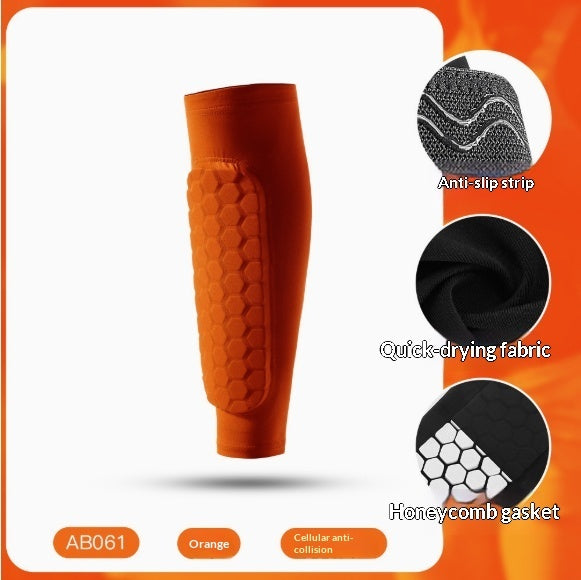 An orange athletic shin guard sleeve with a honeycomb-textured front panel, shown on a white background with three circular feature callouts on the right labeled Anti-slip strip, Quick-drying fabric, and Honeycomb gasket.