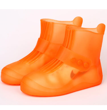 Orange rain boots on a white background