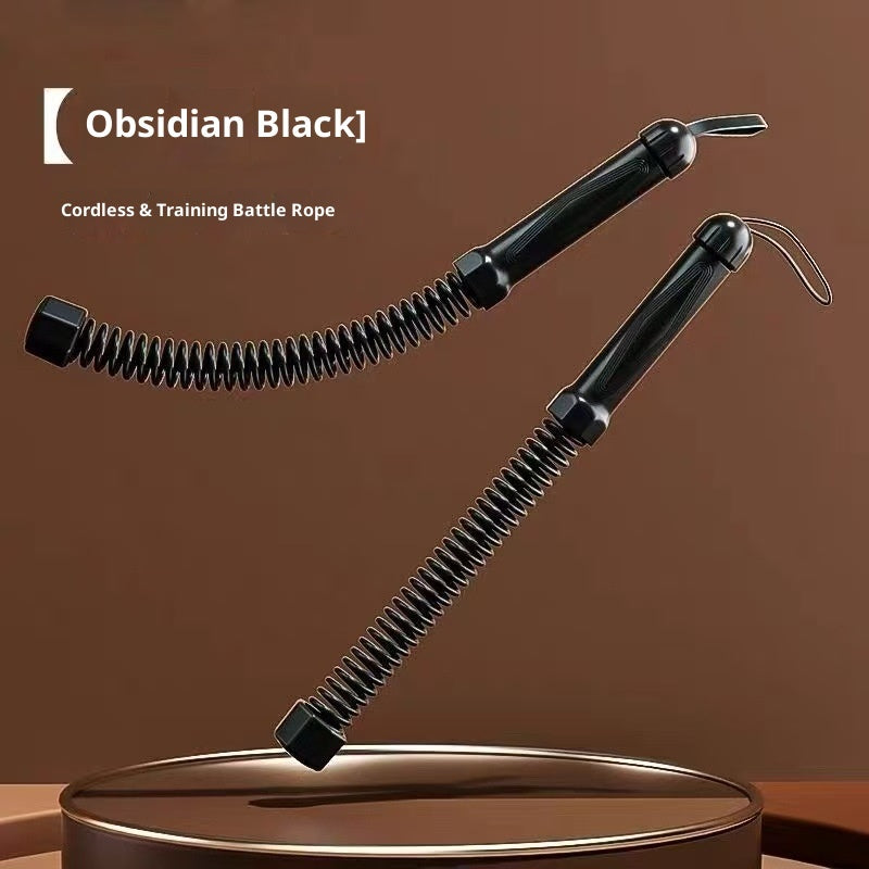 Obsidian Black cordless and training battle rope on a brown background
