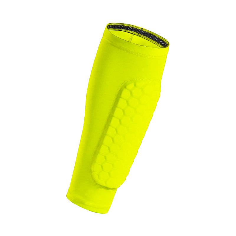 Bright yellow shin guard on a white background