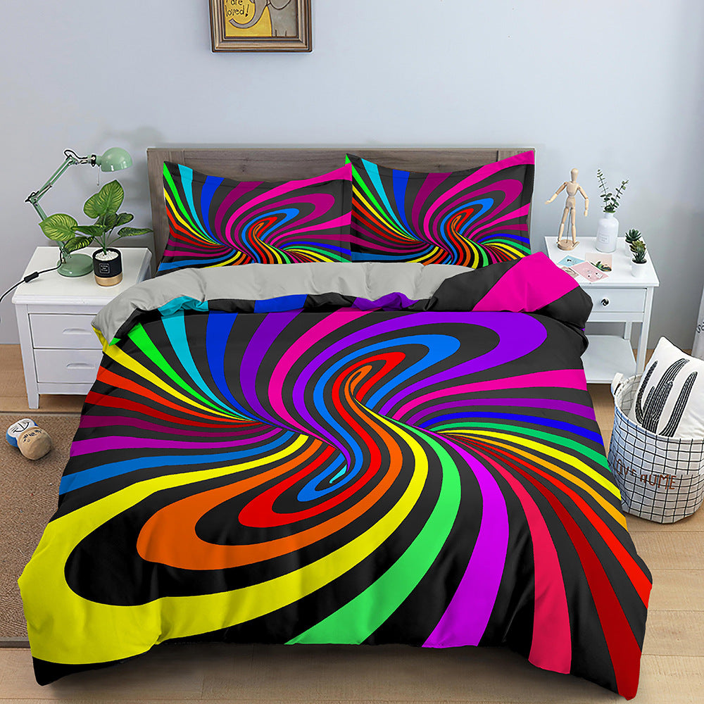 Colorful spiral patterned bedding set on a bed in a bedroom.