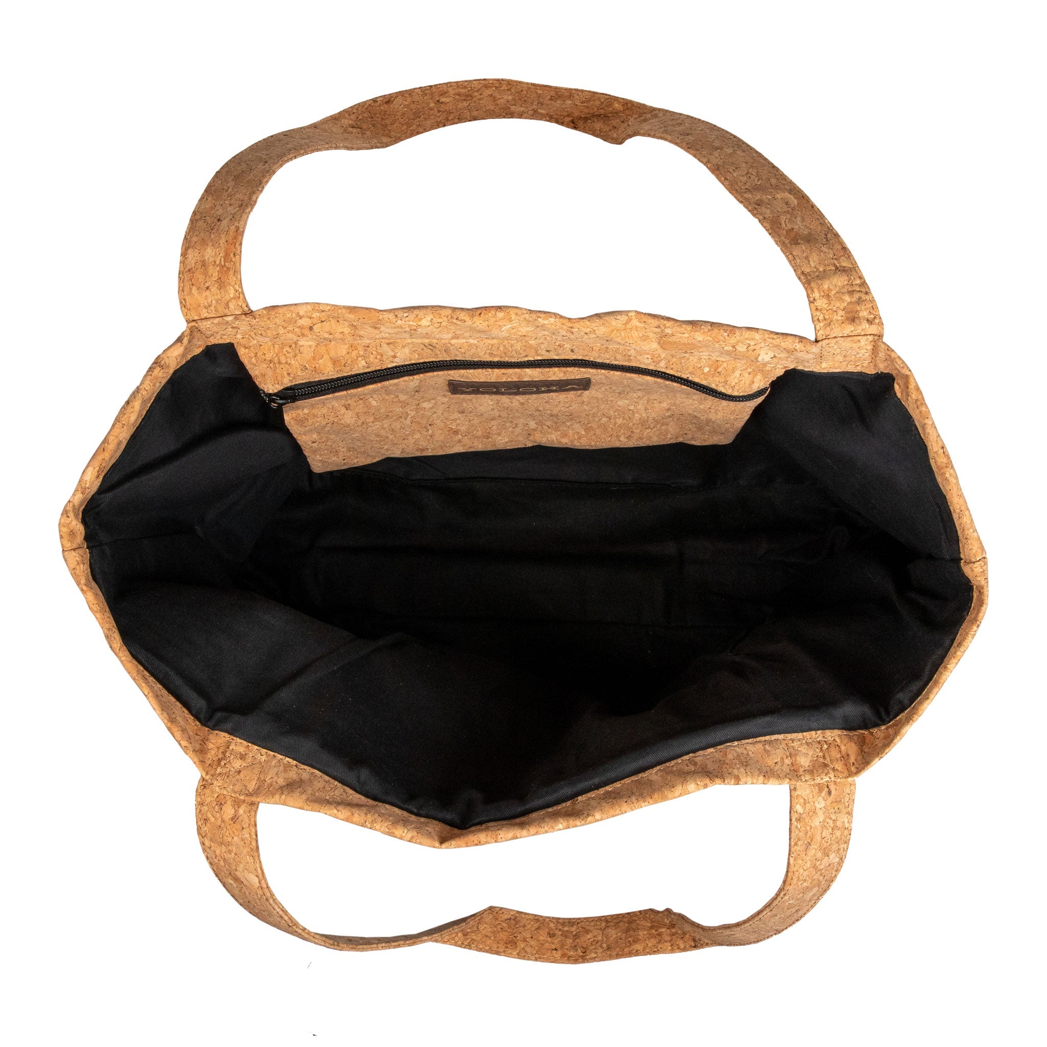 Cork handbag with black interior on a white background