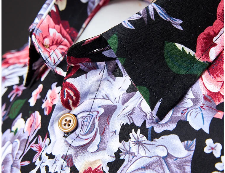 Close-up of a floral patterned shirt with a button.