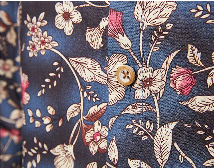 Floral patterned fabric with a button on a blue background