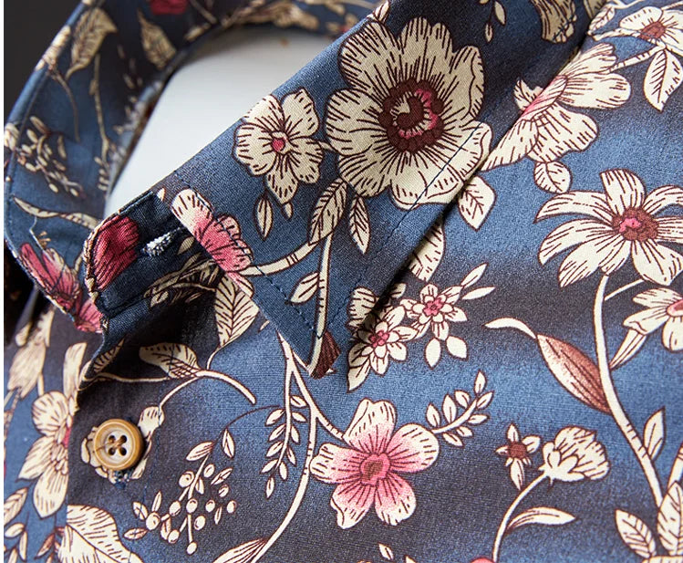 Floral patterned fabric with a button on a blue background