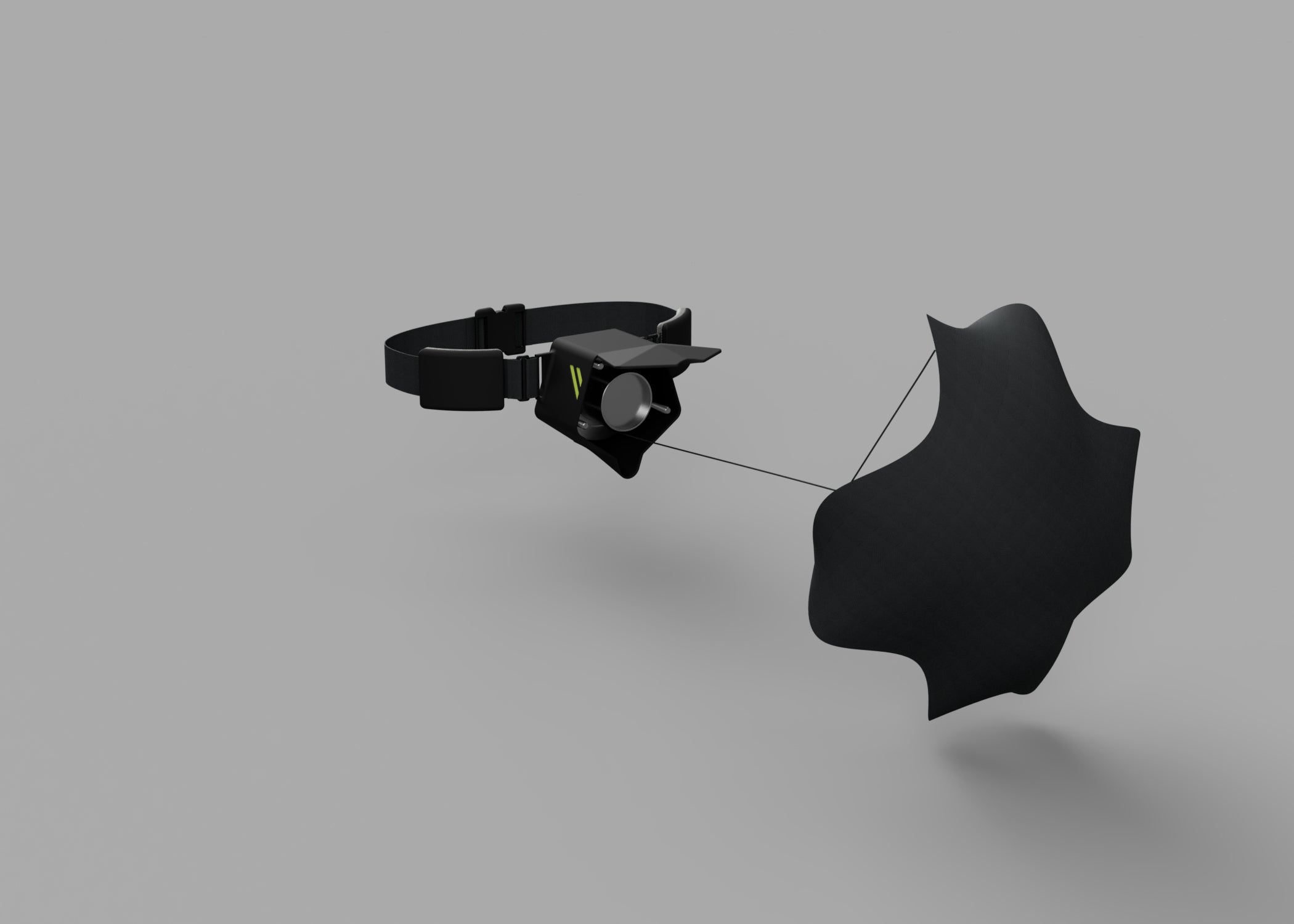 Black waist-mounted parachute and attached black canopy on a gray background