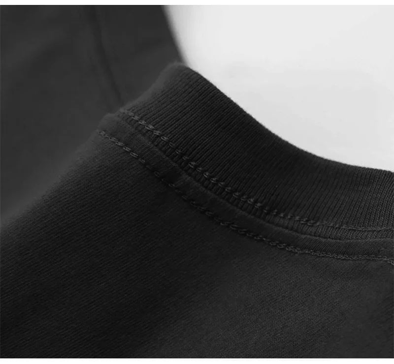 Close-up of a black sweatshirt collar with stitching detail