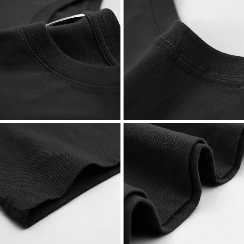 Close-up of a black t-shirt collar and sleeve on a white background