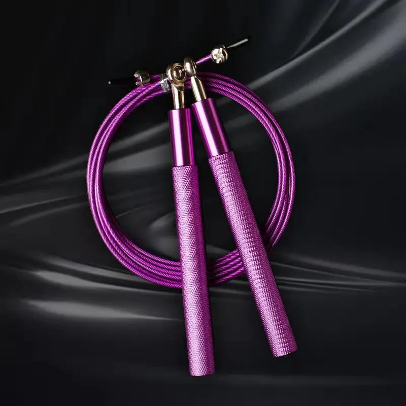 Purple jump rope on a black background