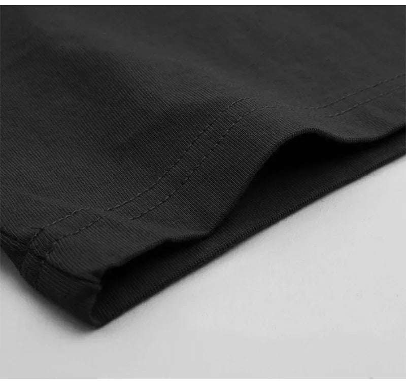 Close-up of black fabric on a light gray background