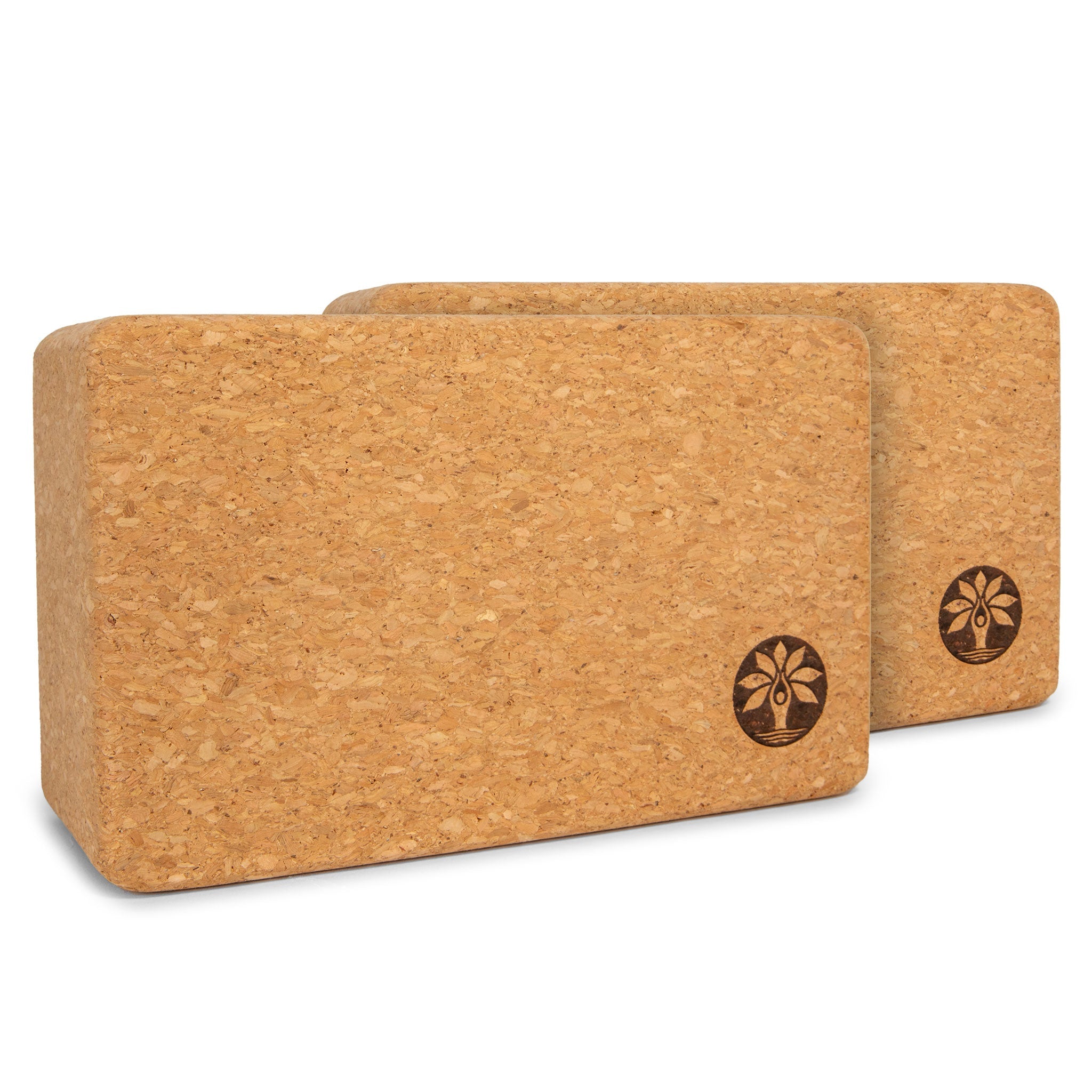 Two cork yoga blocks with a visible brand logo on a white background