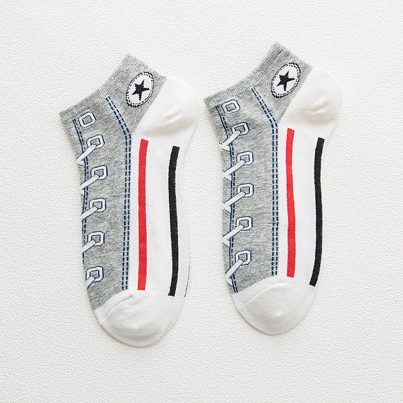 Two pairs of socks with lace design and brand logo on a light background