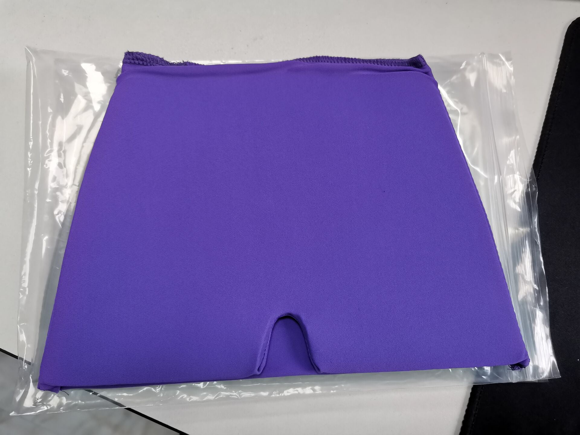 Purple gel headband on a white background