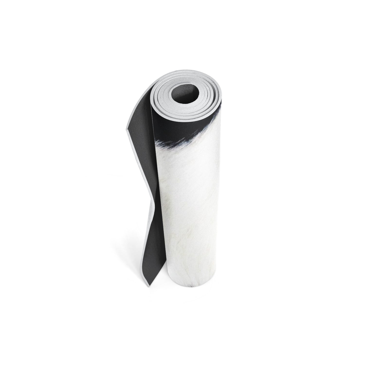 Roll of black and white patterned paper on a white background