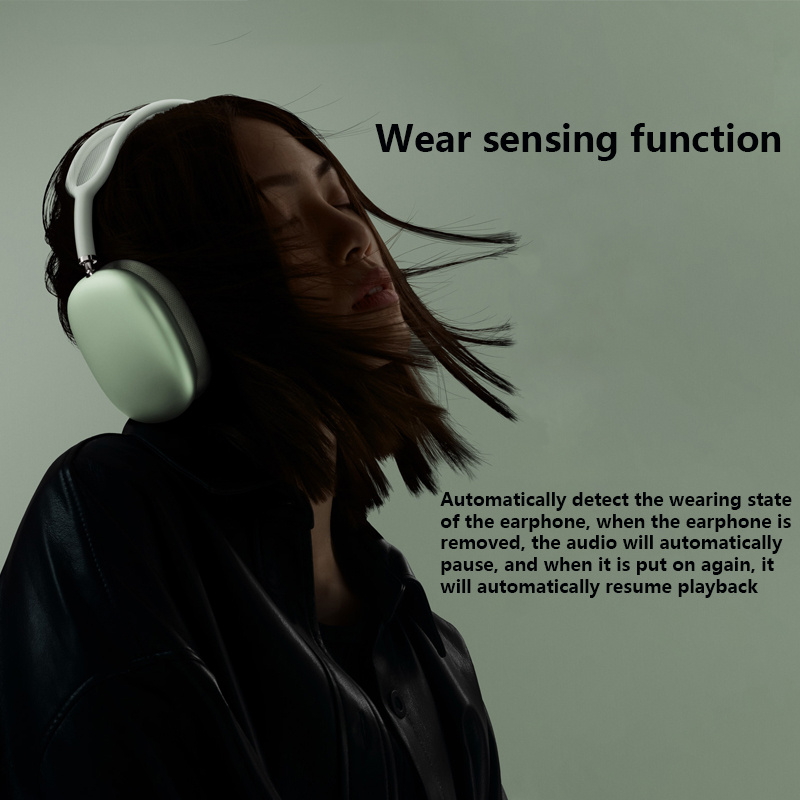 Person wearing headphones with text about wear sensing function on a dark background