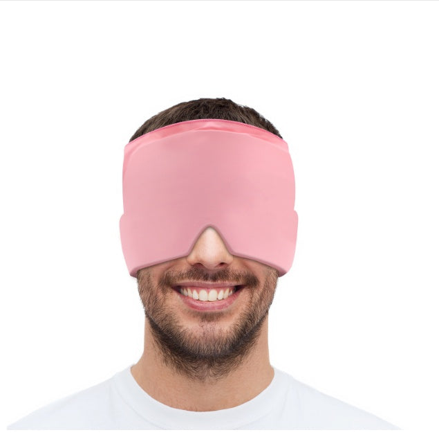 Man wearing a pink sleep mask on a white background