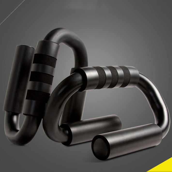Pair of black exercise push-up handles on a gray background
