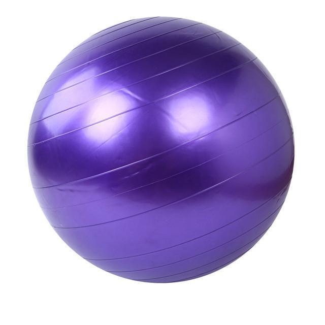 Purple exercise ball on a white background