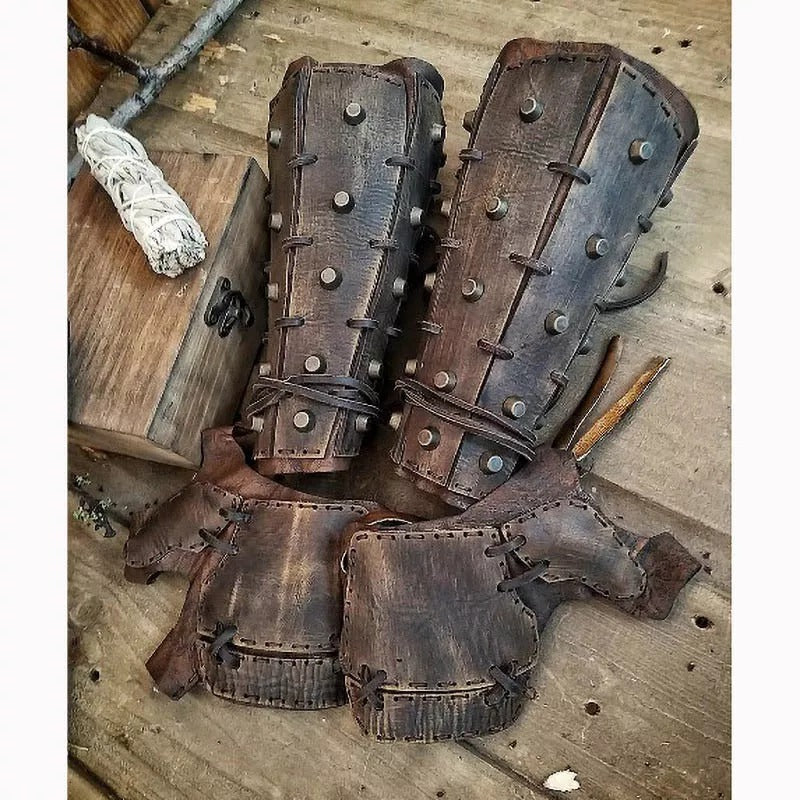 Pair of leather boxing gloves  on a wooden surface