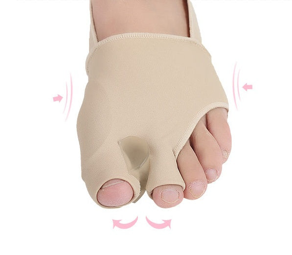 Beige bunion corrector on a foot against a white background