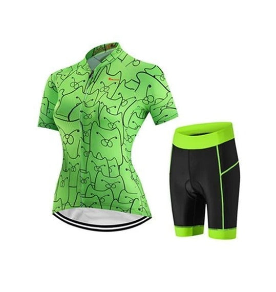 Green cycling jersey with black patterns and matching shorts on a white background