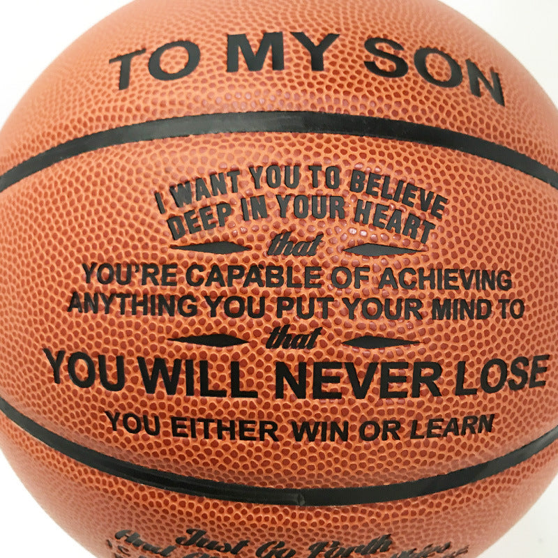 Basketball with motivational message for son on a white background