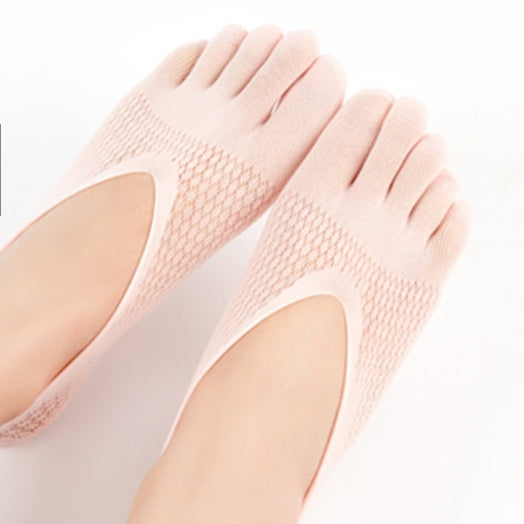 Pair of beige five-finger socks on a white background
