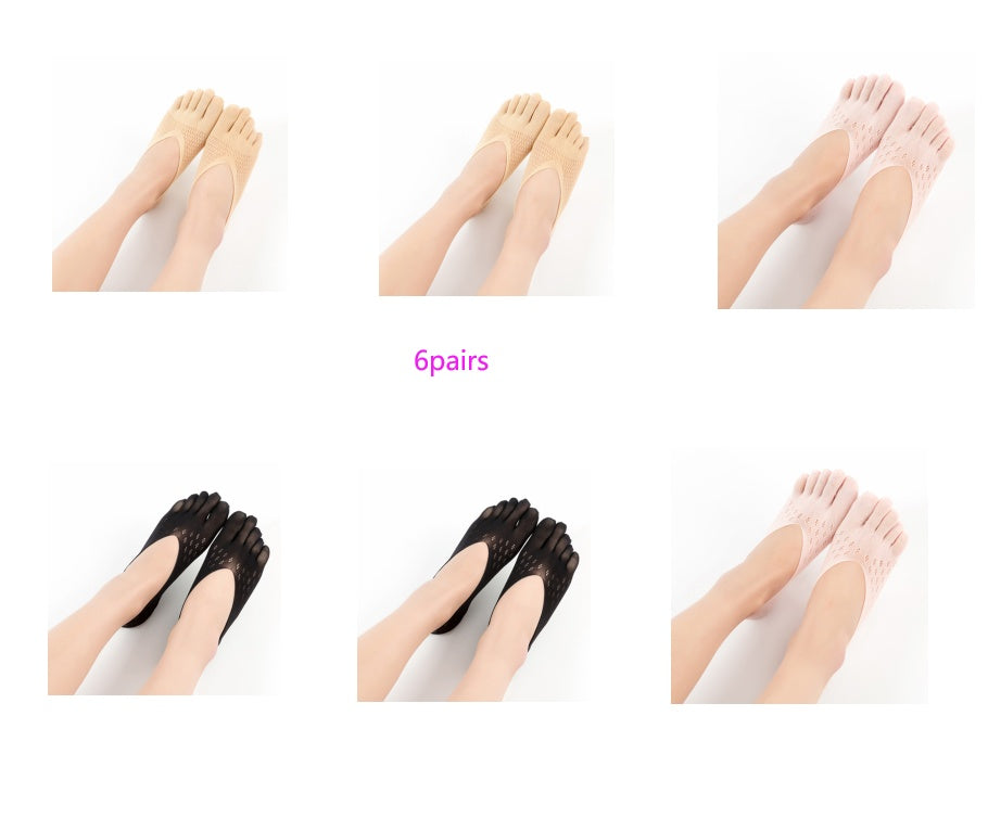 Set of six pairs of socks displayed on feet against a white background.