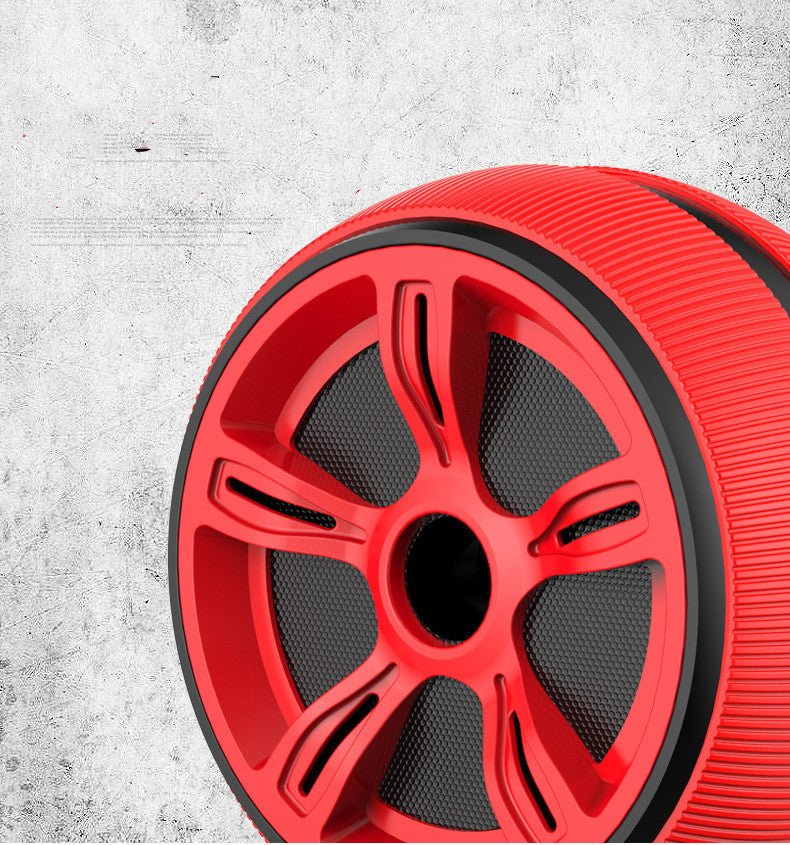 Red wheel rim on a textured gray background