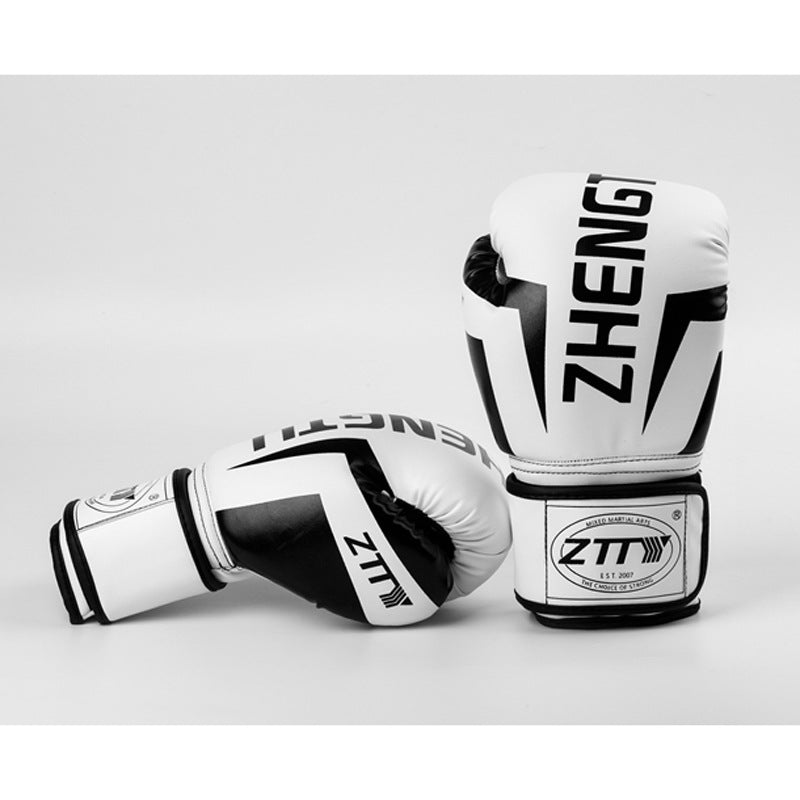 Pair of white and black boxing gloves with 'ZHENG' branding on a light gray background