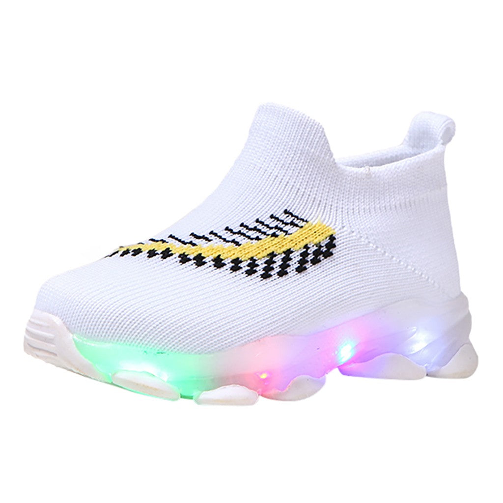 White LED sneakers with colorful lights on a white background