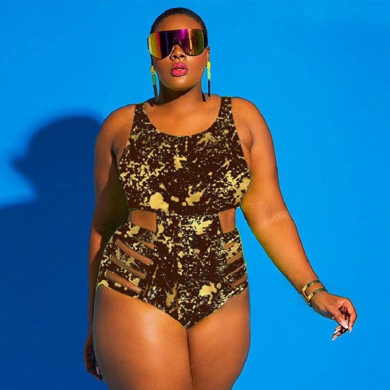 Woman wearing a camouflage swimsuit against a blue background